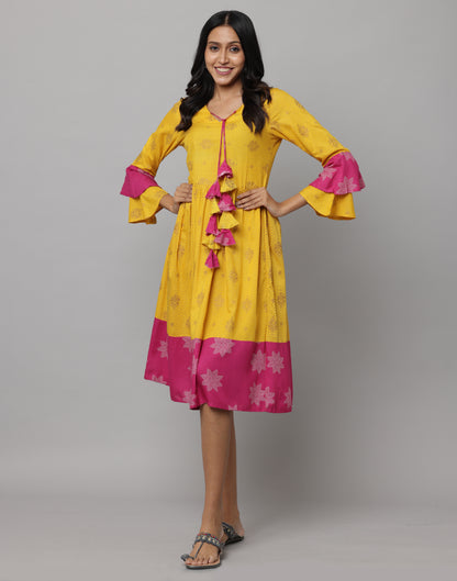 Frock style 3/4th Layered Bell Sleeves Enhanced Self Fabric Tassels with Strings Attachd On The Front Nek Yoke